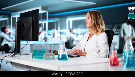 Scientist Researcher Working In Research Lab Developing New Vaccine Stock Photo