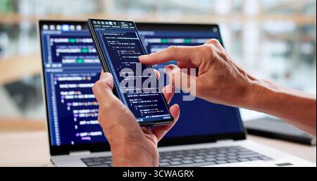 Woman Coder Working On Web Development At Office Desk Stock Photo