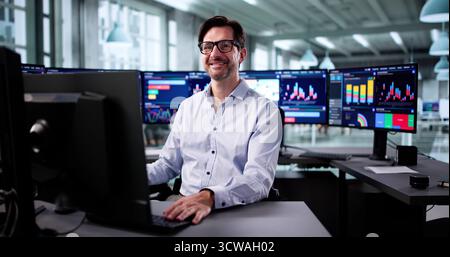 Elderly Businessman Analyzing Financial Growth On Computer Analytics Dashboard Screen. Stock Photo