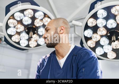 Surgeon in Operating Room Stock Photo
