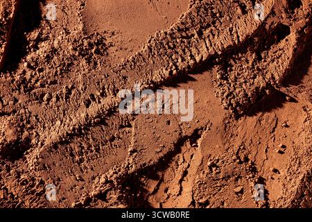 Natural dark brown cocoa powder textured background, close up Stock Photo