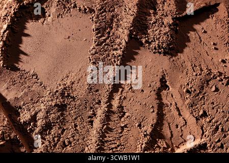 Natural dark brown cocoa powder textured background, close up, top view Stock Photo