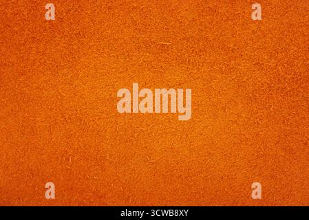 Orange suede. Texture of natural suede. Background of suede leather of orange color Stock Photo