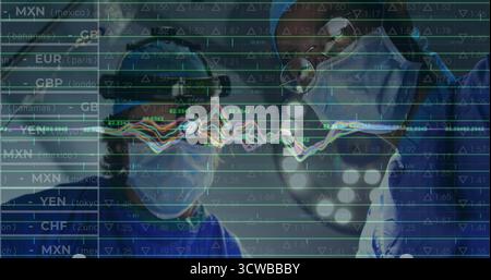 Standing two surgeons wearing scrubs caps goggles masks under lights in OR, with financial overlay Stock Photo
