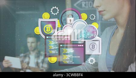 Two tech professionals collaborating on blockchain overlay in office, with tablet and keyboard Stock Photo
