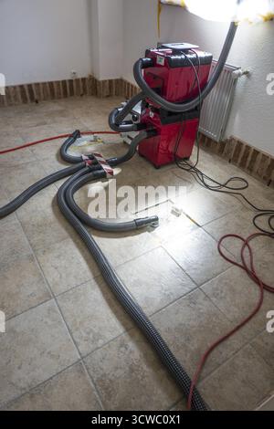 Wet screed is dried in a special process Stock Photo