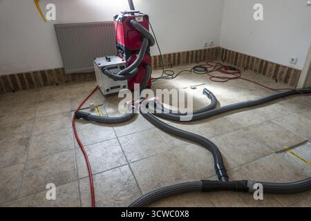 Wet screed is dried in a special process Stock Photo