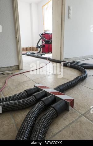 Wet screed is dried in a special process Stock Photo