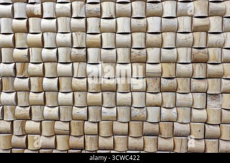 Wall panelling made from square pieces of wood Stock Photo