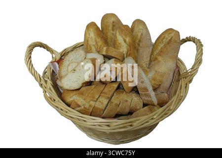 Wicker basket with sliced baguette bread on a white background - cut-out Stock Photo