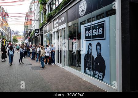 London, UK - 26 July, 2025:  Fans visit the Oasis Live 25 pop-up store on Carnaby Street, Soho, ahead of concert dates at Wembley Stadium Stock Photo