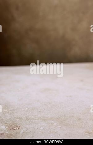 beige table texture and brown wall background Stock Photo