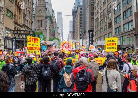 New York City No Kings June Protest With Bold Signs Calling To End Deportations And Support Immigrant Rights On Fifth Avenue NYC Stock Photo