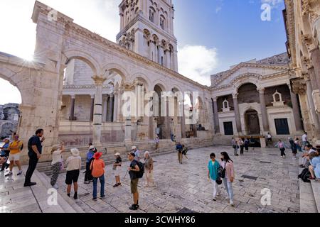 Diocletians Palace, Split. Tourists in the town centre in the middle of the Roman Palace of Diocletian from 3rd century AD; Split Croatia Europe Stock Photo