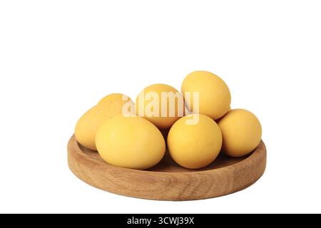 Yellow easter eggs isolated on white background. Top view Stock Photo