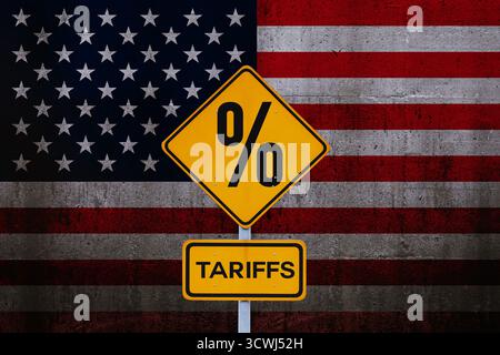 Tariffs. Yellow Road Sign Tariffs On Background Of American Flag, Concept. Trade Wars And Crisis, Creative Idea. US Trade Policy. Tariffs Stock Photo