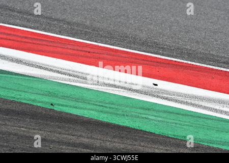 colored curb on a racing track Stock Photo - Alamy