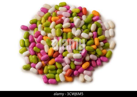 Sweet multicolored candies isolated on a white background. Stock Photo