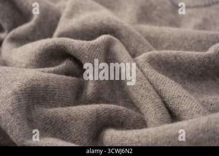 Soft grey merino wool sweater texture as a background. Top view. Stock Photo