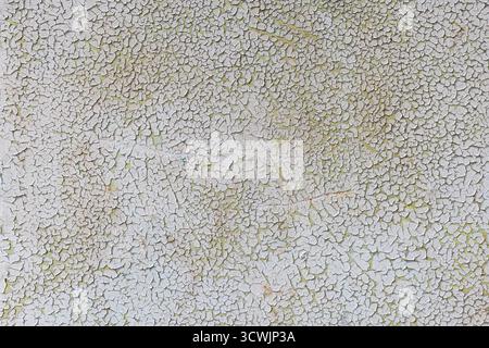 Cracked and peeling white paint texture Stock Photo