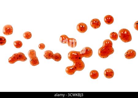Red jam splashes isolated on a white background. Top view. Stock Photo