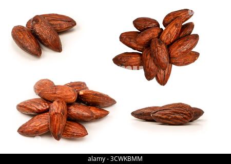 A group of caramelized almonds isolated on a white background. Stock Photo