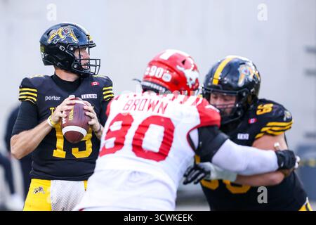 Hamilton Tiger-Cats quarterback Bo Levi Mitchell (19) looks for a pass ...