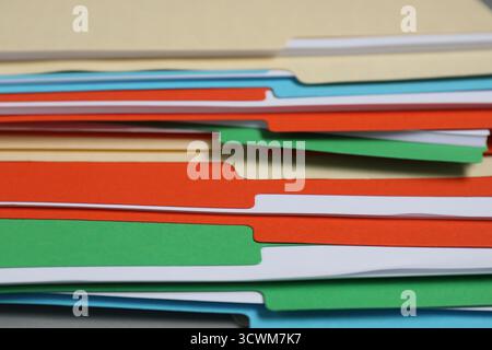 Many documents in folders on table, closeup Stock Photo