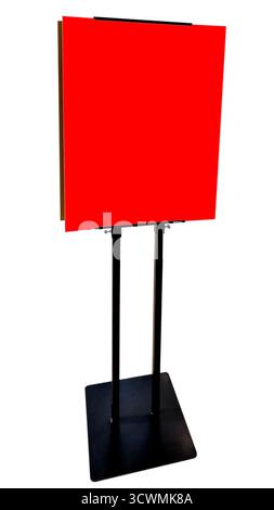 Bright red sign or board, mounted on modern black metal floor stand. Stand features two vertical poles rising from square, flat base, with the sign he Stock Photo