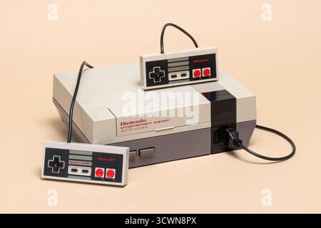 Pavia, Lombardy, Italy - November 23, 2024: Nintendo Entertainment System (NES) Mattel Version video game console, marketed from 1986 to 1995, at the Stock Photo