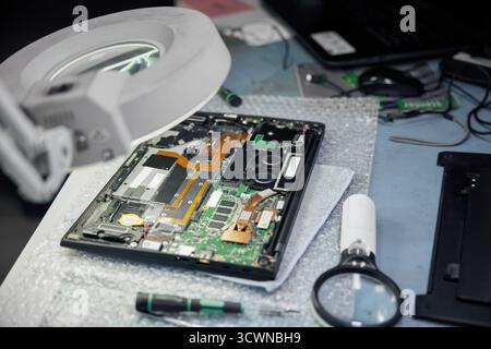 A detailed circuit board on a table in a lab Stock Photo