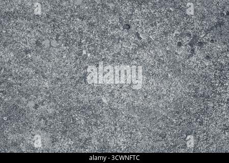 Dark gray concrete wall texture background with rough and natural surface, perfect for industrial, grunge, or modern design projects. Stock Photo