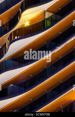 Golden Star Light in a Wavy Balcony Facade Stock Photo