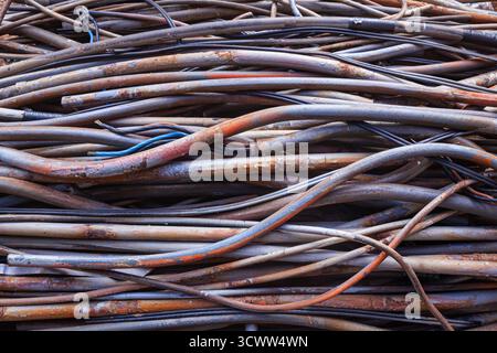 A bunch of old copper cables in a plastic sheath Stock Photo