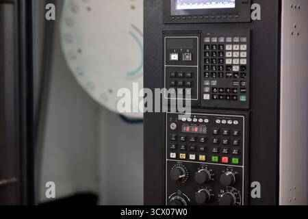 Milling machine with CNC control panel close up. Selective focus. Stock Photo