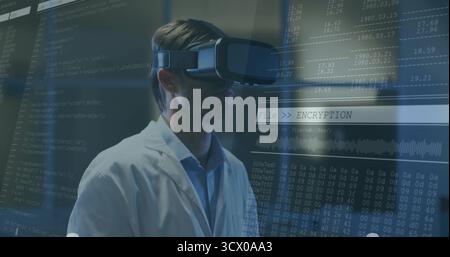 Researcher wearing white lab coat and VR headset analyzing encryption interface and hex code in lab Stock Photo