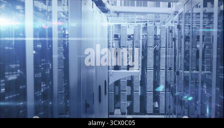Emitting blue glow rack-mounted servers in data center, with network cables and LED indicators Stock Photo