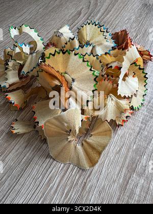 Coloured pencil shavings on a table Stock Photo