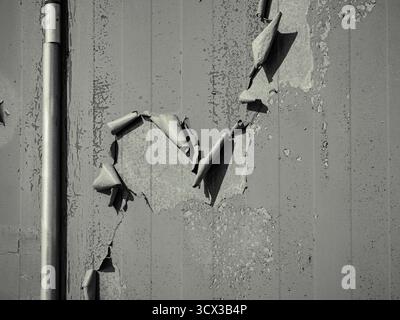 Full frame shot of wall with peeling paint Stock Photo