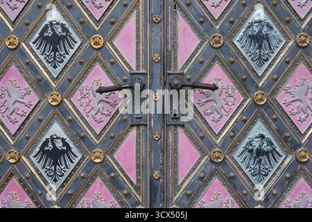 Vysehrad, Prague, Czech Republic, Czechia. Old historical door and doorhandle with ornaments and decoration. National symbol of lion and eagle. Stock Photo