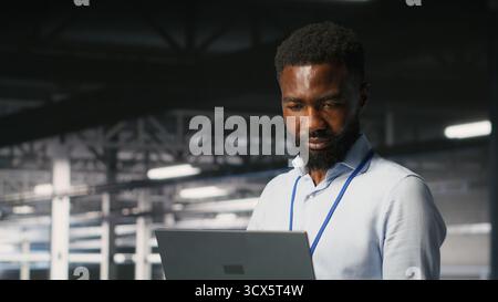Smiling data center engineering team on industrial platform collaborating on neural network software tasks. Jolly server hub colleagues working together, visualizing large language model architecture Stock Photo