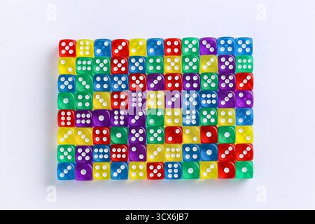 Many colorful game dices on white background Stock Photo
