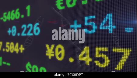 Showing market data on LED grid on trading floor, with colored digits, yen symbols, abstract curves Stock Photo