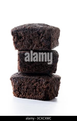 Stack of homemade chocolate brownies isolated on white background Stock Photo