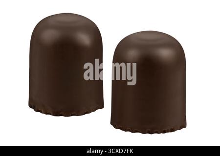 Two small chocolate-covered cakes with foamy sugar isolated on white background Stock Photo