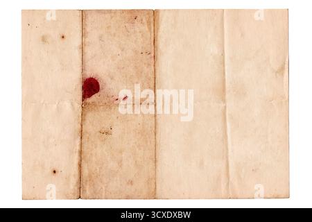 Antique Folded Old Paper Texture Background. Old vintage paper folded in four. Brown crumpled and folded parchment vintage paper sheet with space for Stock Photo
