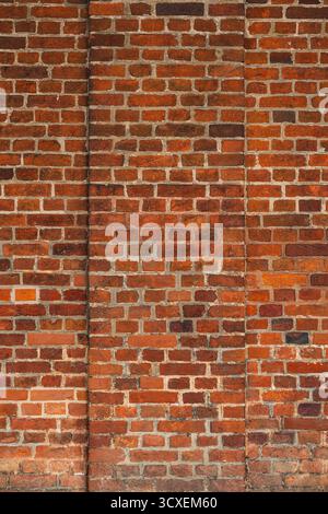 Texture of a medieval wall made from orange bricks Stock Photo
