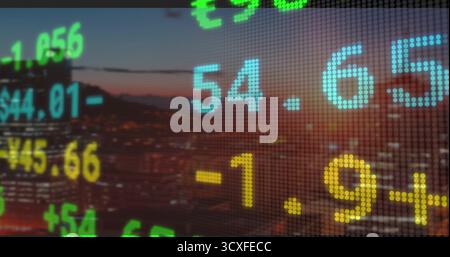 Displaying digital ticker overlaying skyline at dusk, with pixelated numbers and currency symbols Stock Photo