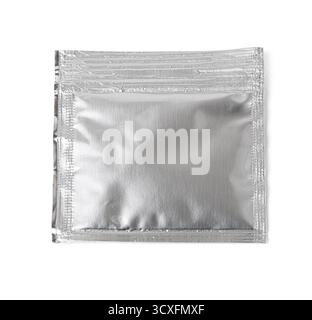Sealed silver foil sachet providing airtight packaging for various products Stock Photo