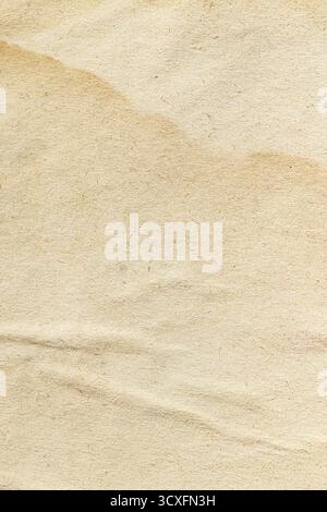 Beige paper background showing textured surface and old aged details Stock Photo